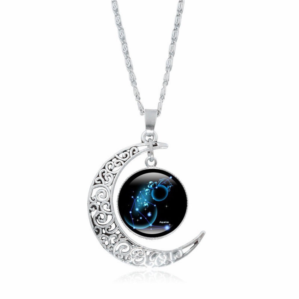 Colar feminino com pingente luminoso de lua prateada, símbolo do zodíaco.