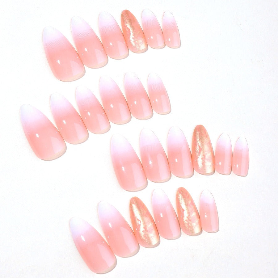 Novos adesivos de unhas postiças com glitter degradê para unhas em formato amendoado.