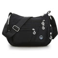 Bolsa transversal feminina com vários compartimentos, leve e com grande capacidade.